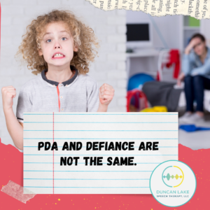 A child with curly hair clenches their fists and makes a tense, frustrated expression while standing in a room. In the blurred background, an adult sits with their head in their hand, appearing stressed. Overlaid text reads, “PDA and defiance are not the same,” with the Duncan Lake Therapy Collective logo in the corner.